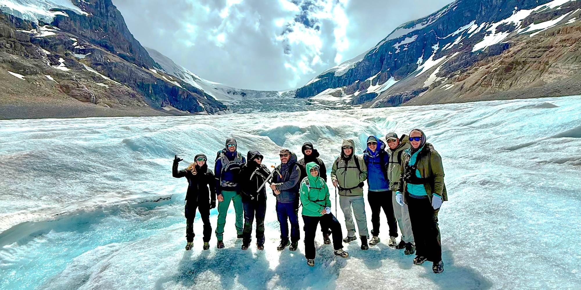 A family group glacier hiking at Athabasca Glacier